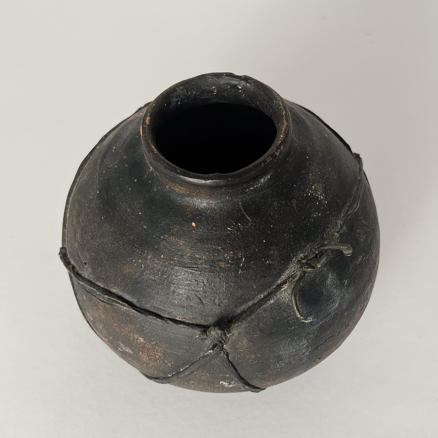 black terracotta vessel