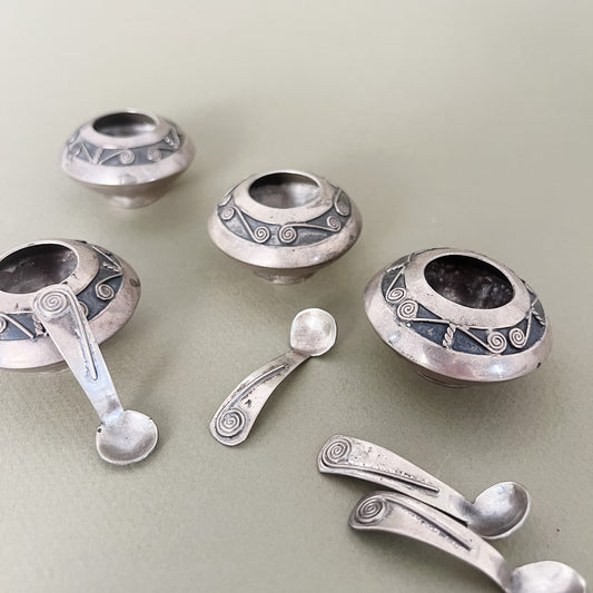 salt cellars with spoons