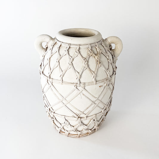 white terracotta vessel